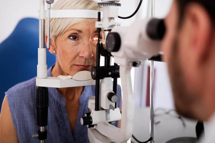 Woman getting an eye exam