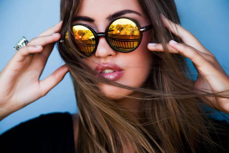 Stylish woman wearing sun glasses